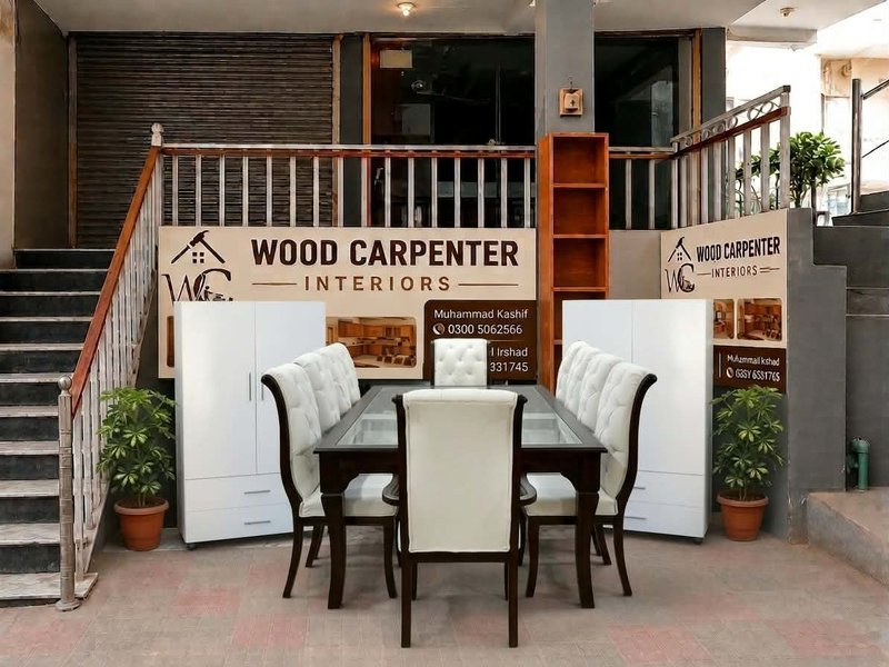 Dining table and upholstered chair set on display at showroom